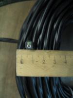 Фотография сечения медного силового двухжильного кабеля ВВГнг-LS 2х2,5 для стационарной прокладки электропроводки в общественных помещениях